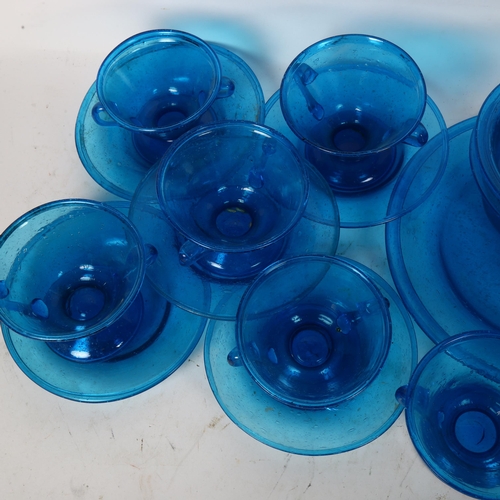 432 - A set of 6 blue bubble glass 2-handled cups, 4 matching saucers, plate and 2 bowls