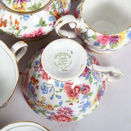 455 - Extensive Grosvenor china tea service and matching coffee set, with floral chintz design, including ... 