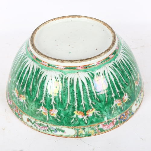 456 - A green ground Chinese bowl with stylised floral decoration, diameter 33cm