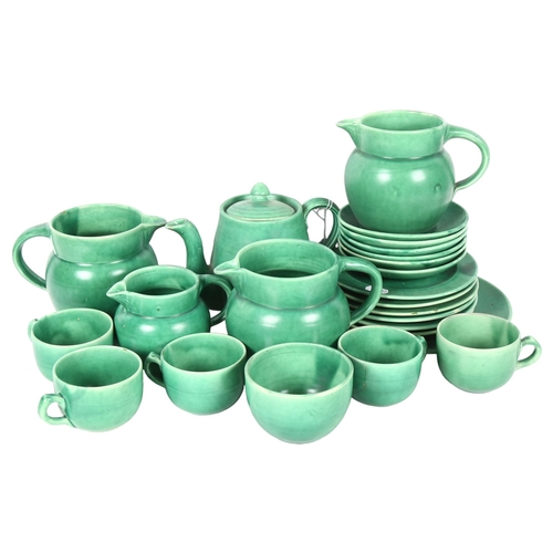 461 - A Barnstaple green glaze tea set, including a teapot and 4 jugs