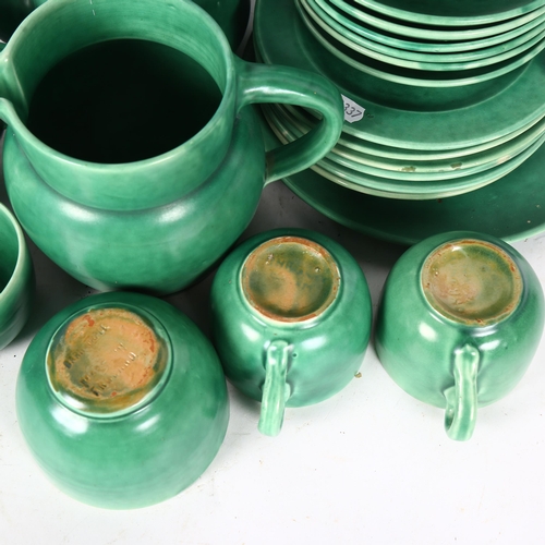 461 - A Barnstaple green glaze tea set, including a teapot and 4 jugs