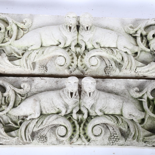 464 - A pair of moulded concrete panels with designs of walruses and scrolled foliate decoration, length 7... 