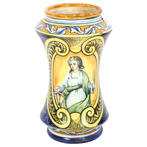 490 - An Antique Maiolica vase, decorated with a picture of a lady and various wild fruits, a hole has bee... 