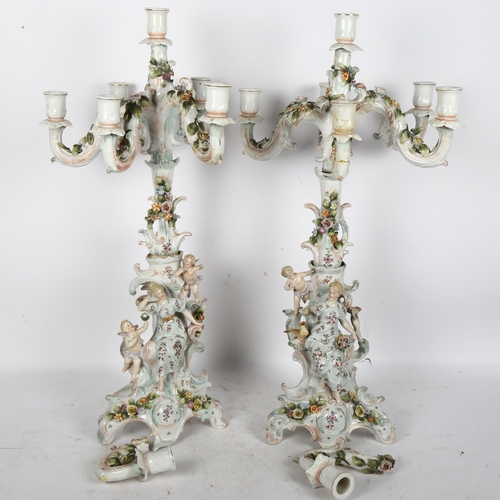 493 - A pair of Antique German 6-branch table candelabras, encrusted with painted flowers, figures and che... 