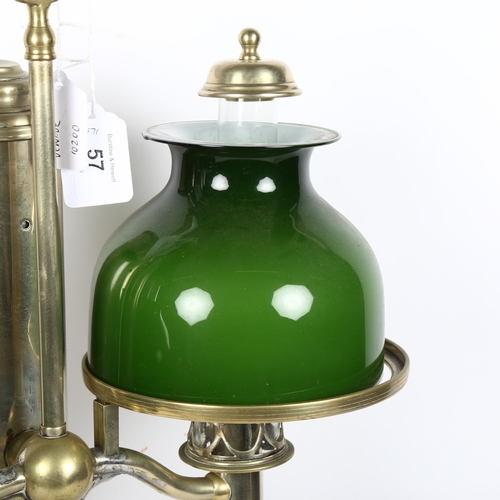 497 - MILLER & SONS PICADILLY - a polished brass double adjustable student's oil lamp, with green glass sh... 