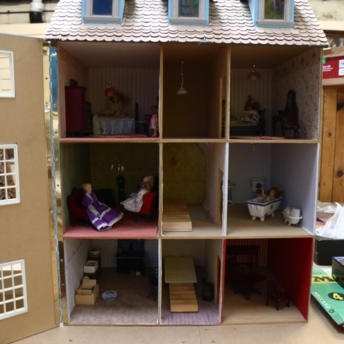 519 - A Regency style doll's house, over 4 floors with partially fitted interior, some dolls and accessori... 