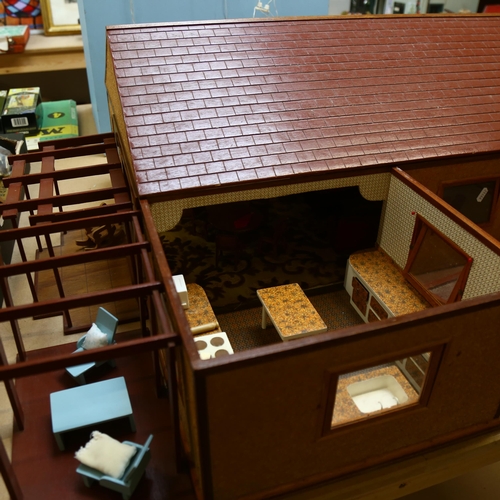 520 - A modern bungalow doll's house made in the 1980s, with fitted interior, and some furniture, H38cm, L... 