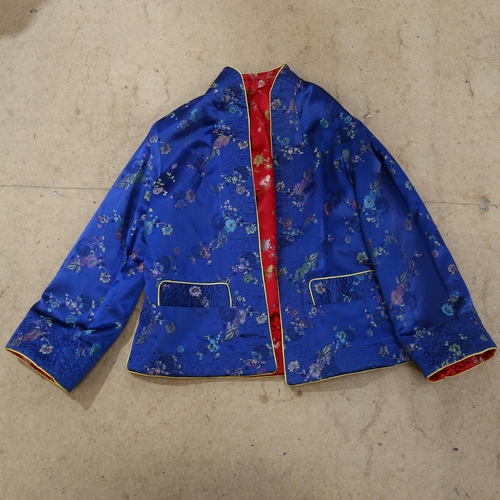 534 - A lady's Chinese style reversible dark red and dark blue silk jacket, with floral design, no size