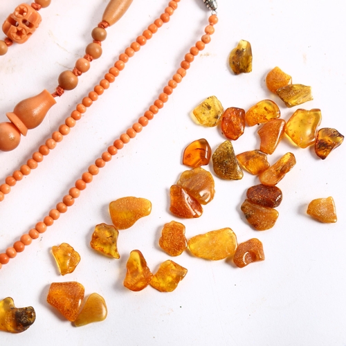 851 - A group of necklaces, to include coral bead necklace, an oval glass bead necklace, a small bag of am... 