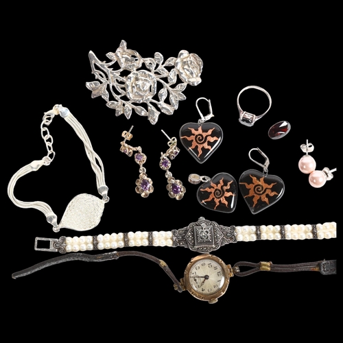 853 - A 9ct gold-cased lady's wristwatch, a silver rose floral brooch, a silver bracelet, a pearl and marc... 