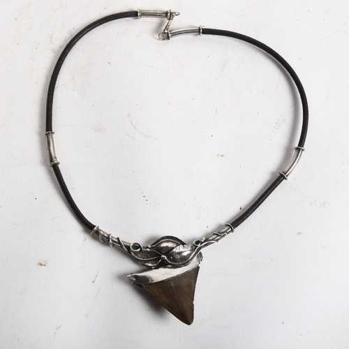 859 - A Scandinavian shark's tooth pendant necklace, white metal mounts