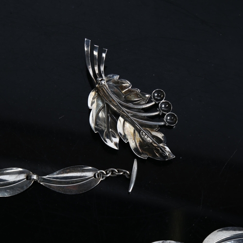 862 - HERMANN SIERSBOL - a Danish sterling silver modernist leaf line necklace, and similar brooch