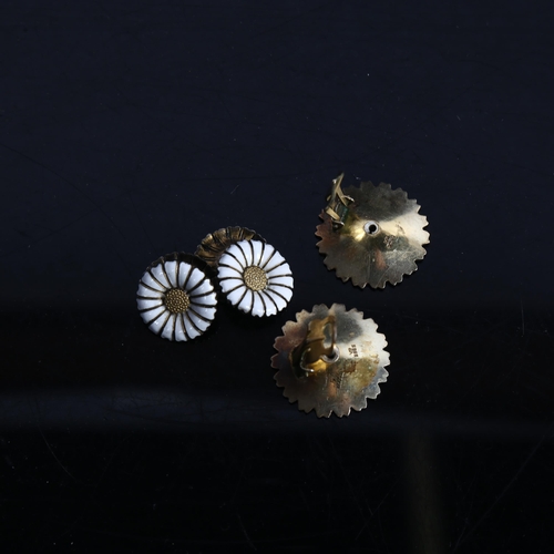 864 - VIGGO PEDERSEN - a of silver-gilt and white enamel daisy pattern clip-on earrings, and a similar pai... 