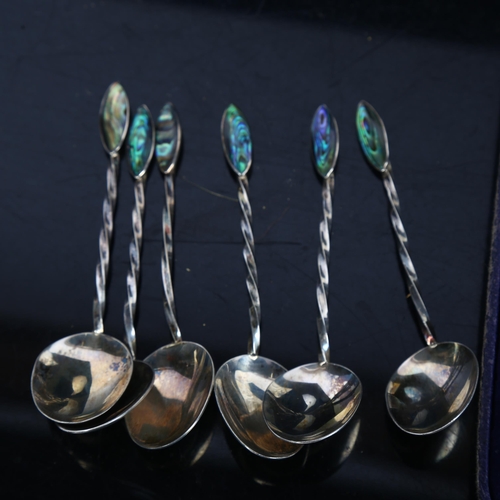 877 - A cased set of 6 silver teaspoons with matching tongs, by Walker & Hall, and a set of 6 unmarked sil... 