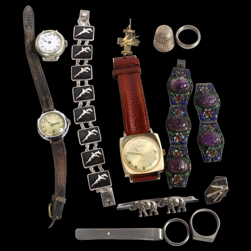 879 - A group of silver, watches, and other items, including thimbles, an enamelled silver bracelet with s... 