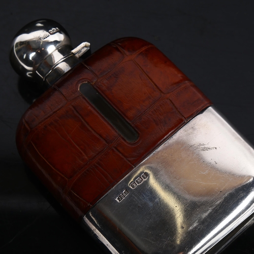 902 - A George V silver and half leather-covered hip flask, with silver cup, Sheffield 1926