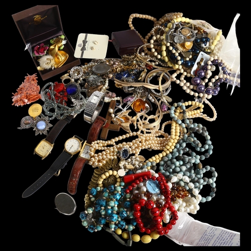 906 - 2 tins of mixed Vintage and other costume jewellery and wristwatches, including white quartz, beads,... 