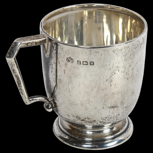 912 - A George V silver christening mug, with monogram and dated April 1939, hallmarks for Birmingham 1936... 