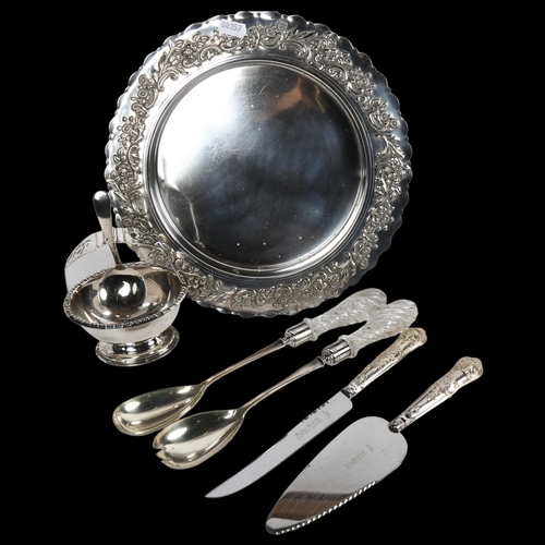 804 - An embossed silver plated circular stand, silver-handled bread knife and cake slice, pair of glass-h... 