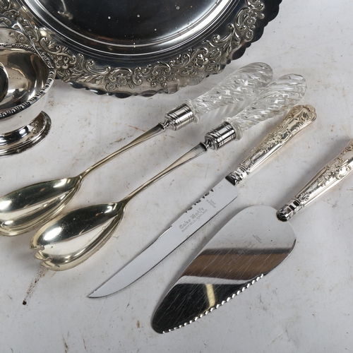 804 - An embossed silver plated circular stand, silver-handled bread knife and cake slice, pair of glass-h... 