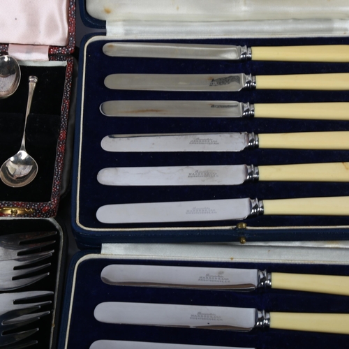 805 - A cased set of 6 silver coffee spoons, and 2 cased sets of butter knives, retailed by Harrods