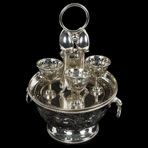 806 - Silver plated 4-piece egg cup on stand, plated centre bowl, and a cased set of stainless steel forks