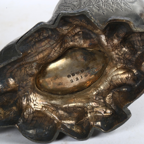 812 - A Victorian pewter nautilus shell design spoon warmer