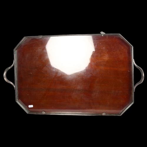 821 - JOHN GRINSELL & SONS - a late Victorian rectangular 2-handled serving tray, with canted corners, pie... 