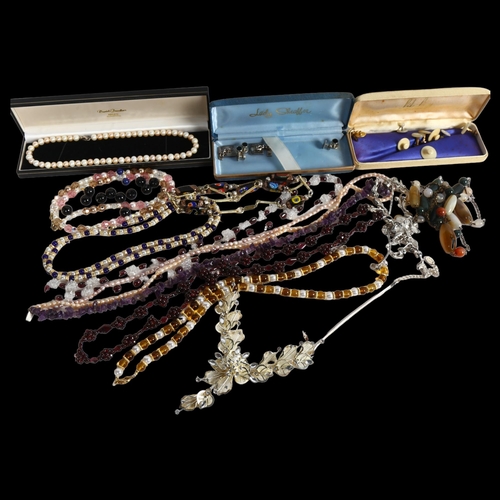 831 - A group of modern costume jewellery, to include an amethyst necklace, bead necklaces, 2-colour pearl... 