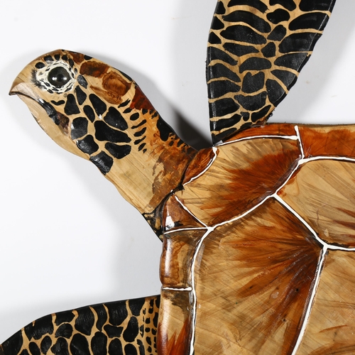 2892 - A painted wood wall-mounted turtle, 92cm