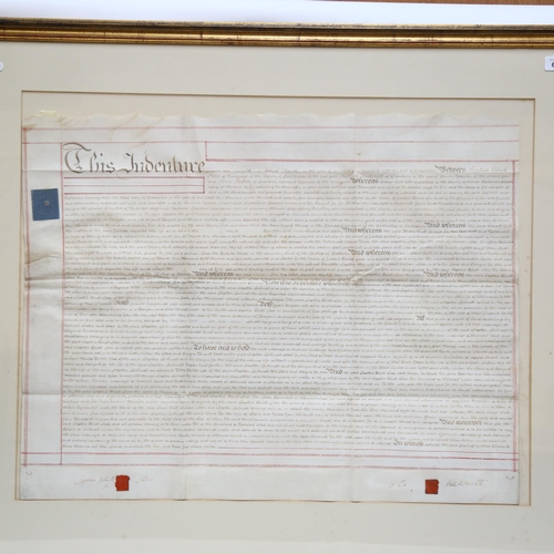 675 - A George IV velum Indenture, dated 1817, complete with wax seal, cost of £1, 86cm x 100cm, framed