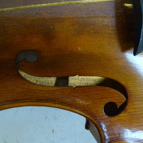 202 - An Antique violin, no labels, in a wooden case, L35cm