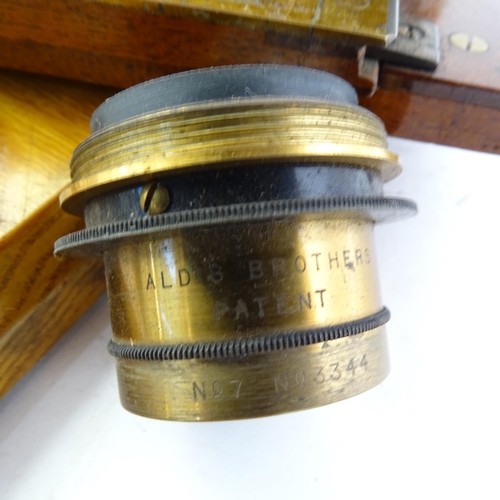 43 - A mahogany and brass-plate half camera, no maker's plaque or name, patents nos. 14940-1905 and 1635-... 