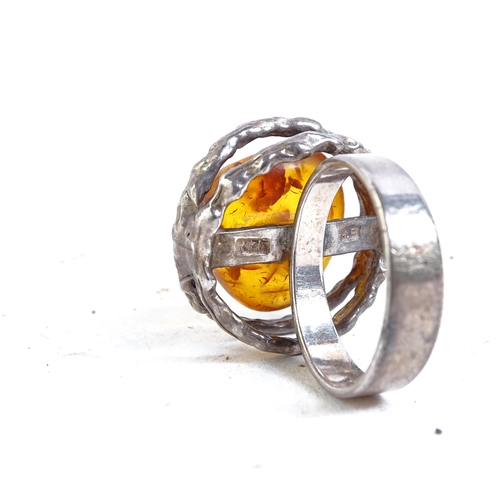 857 - Various Danish silver and amber jewellery, to include 2 rings, a bracelet, a necklace, a Georg Jense... 