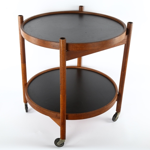 13 - Hans Bolling for Torben Orskov, a 1963 design oiled walnut folding trolley/table with reversible bla... 