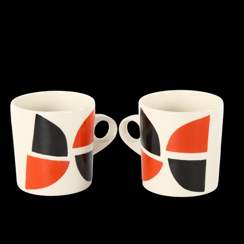 32 - A pair of Terry Frost design mugs , signed to base, height 8.5cm