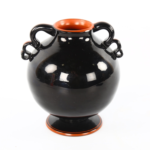 35 - William Sternberg for Gullascruf, Sweden, a 1930s' globe vase on flared base, with black and red gla... 