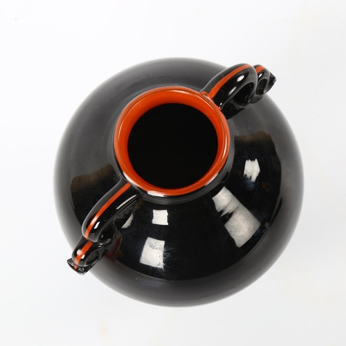 35 - William Sternberg for Gullascruf, Sweden, a 1930s' globe vase on flared base, with black and red gla... 