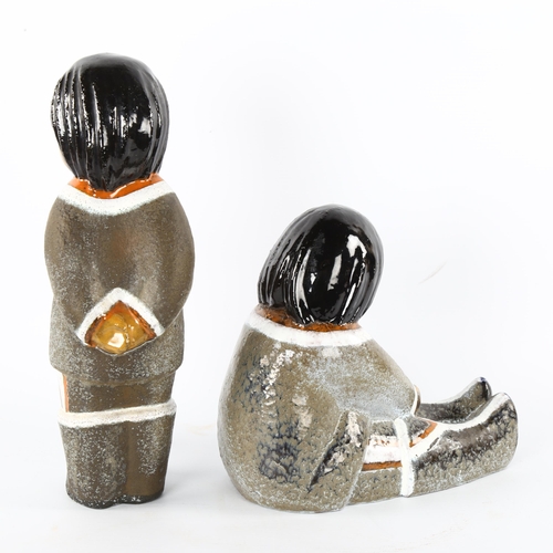 36 - Vicke Lindstrand for Upsala Ekeby, a pair of Inuit figures, deigned 1947, tallest 31cm