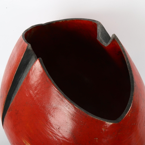 45 - Helene Van Dongen, Holland, a large raku fired red glaze vessel, impressed makers mark to base, heig... 