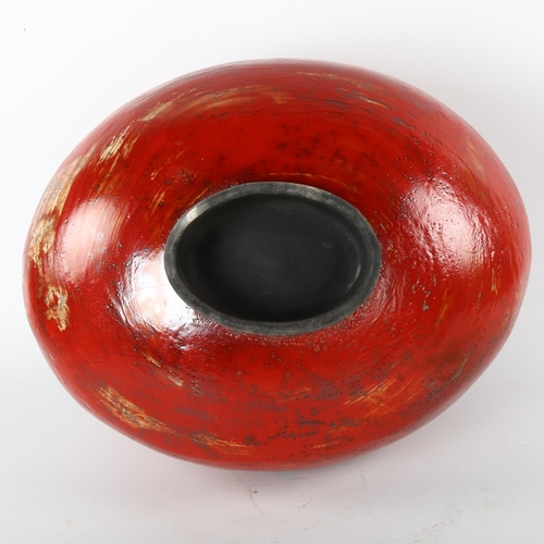 45 - Helene Van Dongen, Holland, a large raku fired red glaze vessel, impressed makers mark to base, heig... 