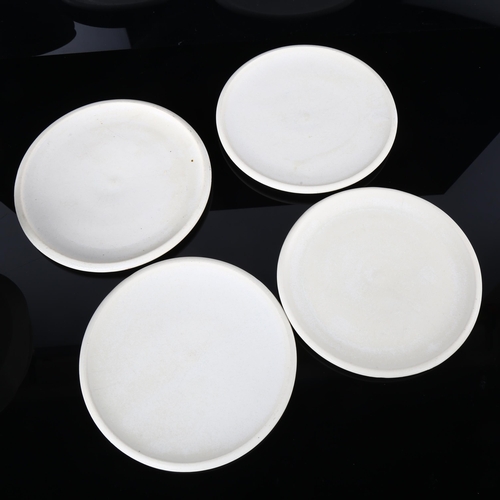 49 - Trish Phillips studio pottery, dolomite glazed, 4 side plates, 4 bowls, impressed makers marks.