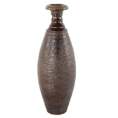 54 - Adrian Davies studio pottery, a tall textured vase, with makers mark, height  38cm