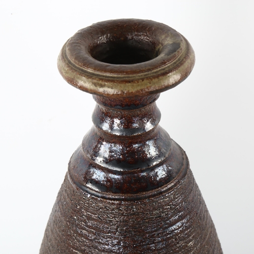 54 - Adrian Davies studio pottery, a tall textured vase, with makers mark, height  38cm