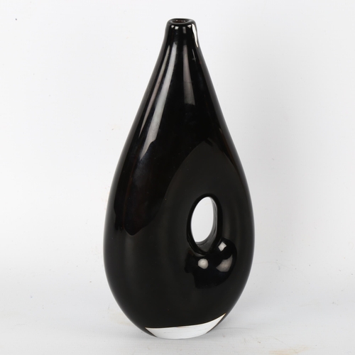 101 - Vicke Lindstrand for Kosta, a black glass pierced vase, signed Kosta LH1186, designed 1952/53 after ... 