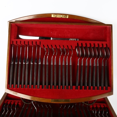 63 - A complete canteen of cutlery, by Joseph Rodgers, Sheffield, Manhattan pattern, in mahogany cabinet,... 