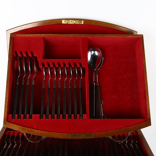 63 - A complete canteen of cutlery, by Joseph Rodgers, Sheffield, Manhattan pattern, in mahogany cabinet,... 