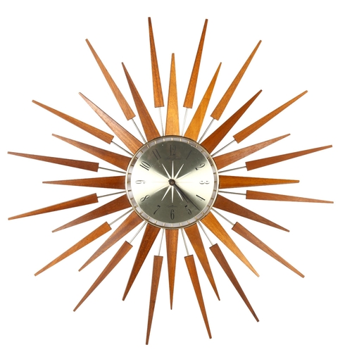 76 - A mid century sunburst quartz clock, Seth Thomas, Scotland, diameter 66cm