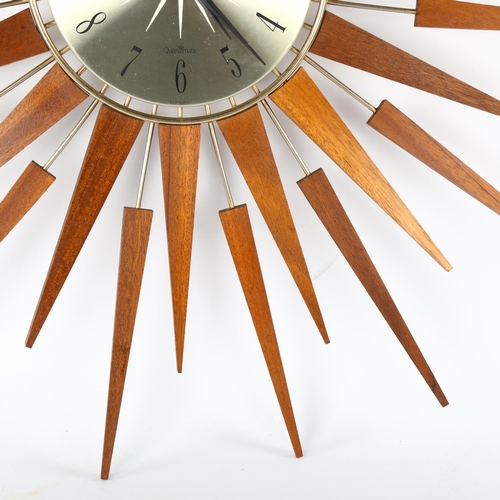 76 - A mid century sunburst quartz clock, Seth Thomas, Scotland, diameter 66cm