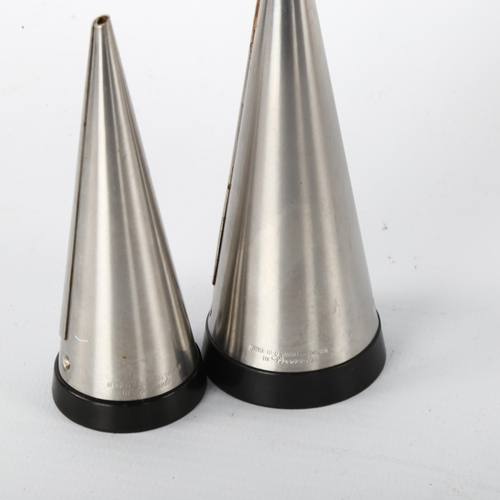 80 - Pierre Forsell for Gense, Sweden, a pair of stainless steel and black bakelite salt and pepper shake... 